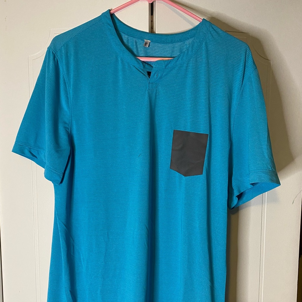 Lulu Lemon light blue dry shirt with fake pocket